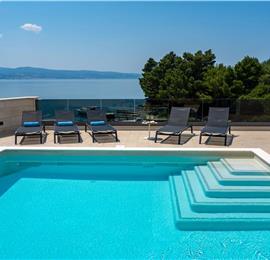 5 bedroom beachfront villa with heated pool near Omis, sleeps 9